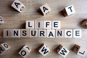 life insurance spelled out in wooden blocks